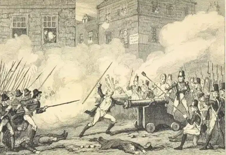 Historical illustration of the 1798 Rebellion in Ireland, showing Irish rebels clashing with British soldiers in a smoky street battle with muskets and cannon fire, featured at the National 1798 Rebellion Centre, Enniscorthy.